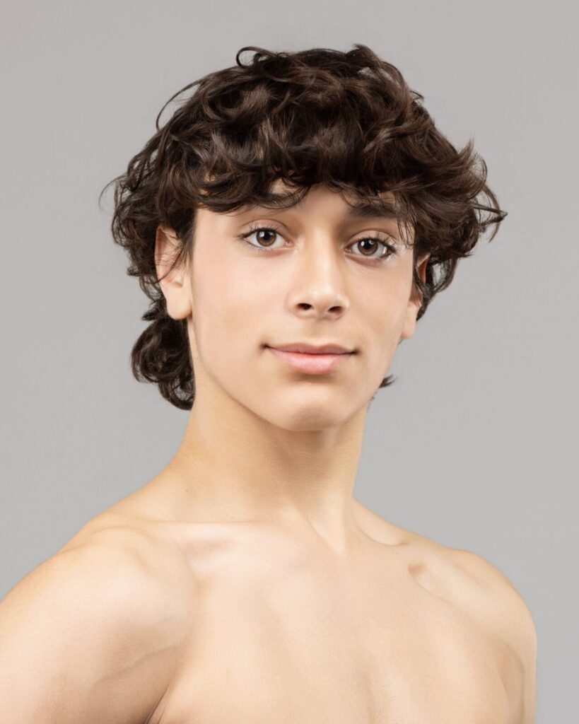 Male dancer audition headshot on a clean backdrop, Houston