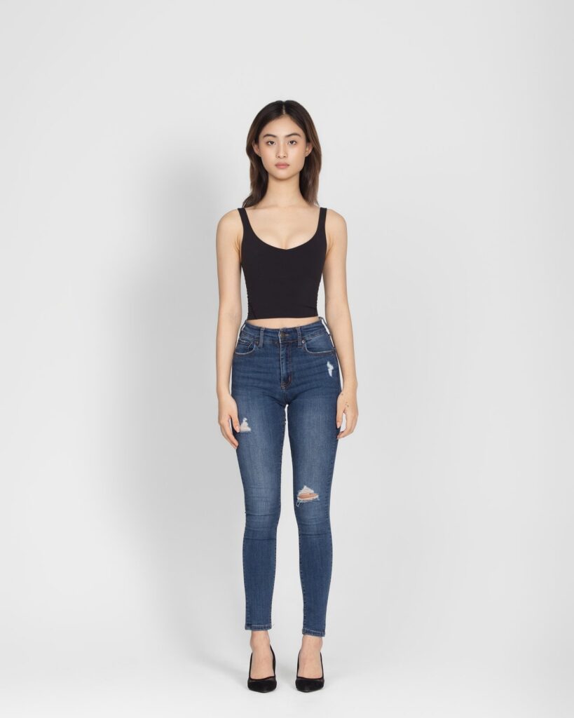 Full-length model digital in jeans and a black top, Houston model portfolio photography