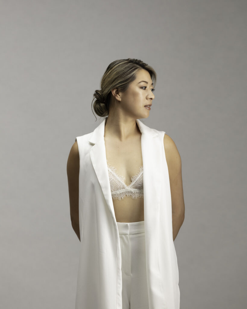 Personal branding photography in Houston, woman in a white vest and lace portrait, by Ashkan Image